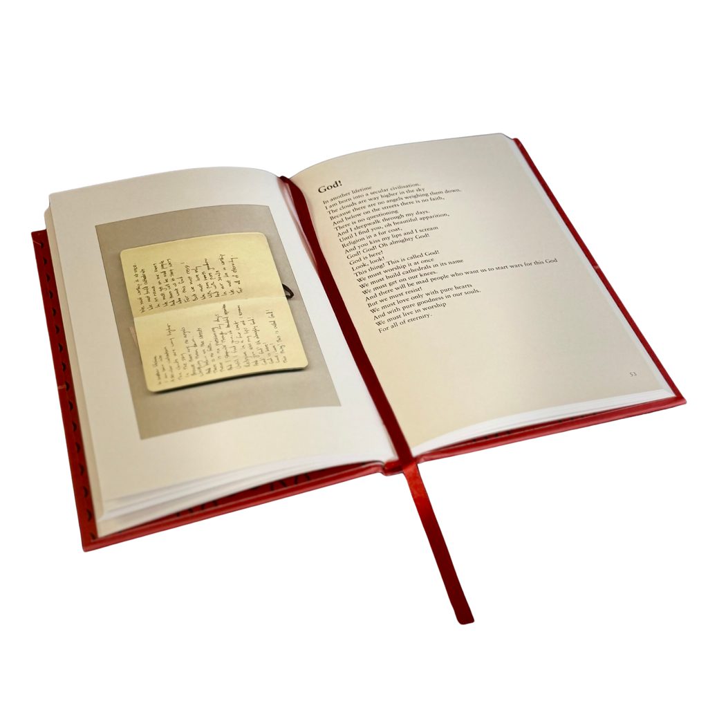 An open hardcover book with a red ribbon bookmark, showing printed text on the right page and a small inset photograph or page on the left page, isolated on a white background.