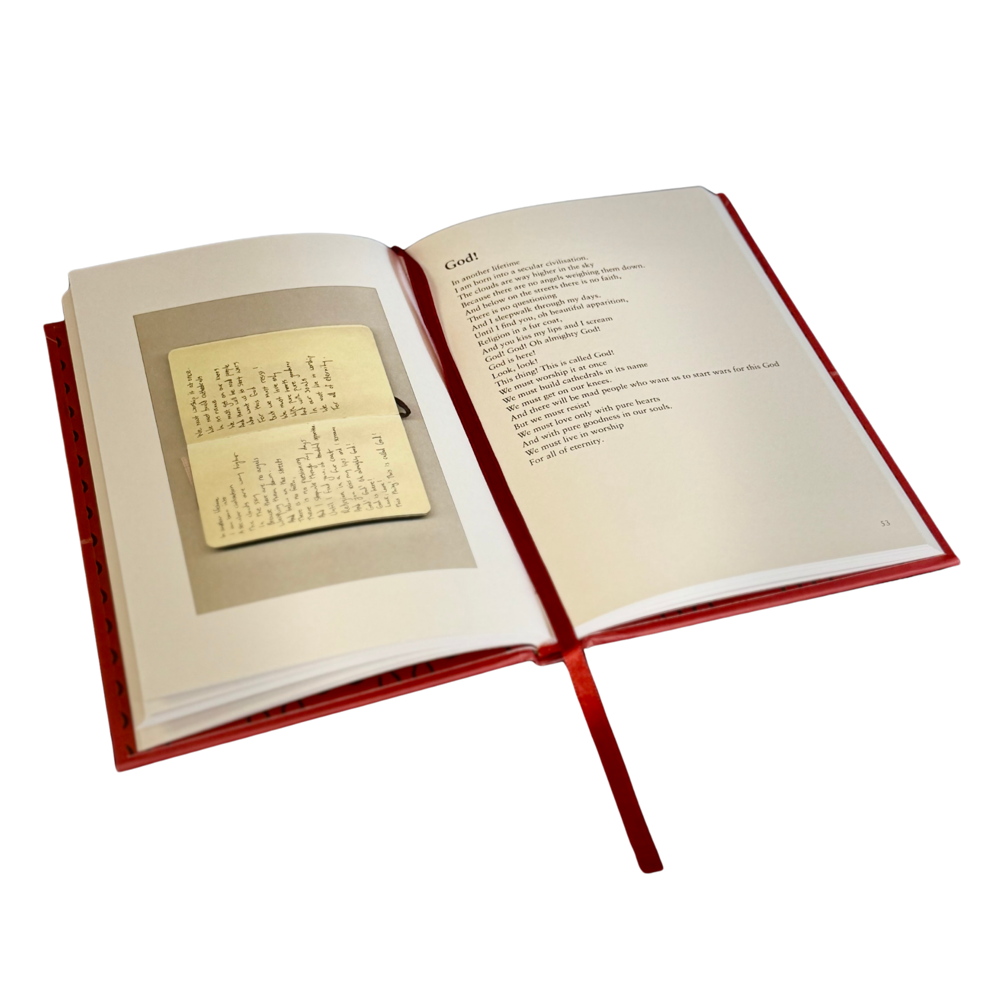 An open hardcover book with a red ribbon bookmark, showing printed text on the right page and a small inset photograph or page on the left page, isolated on a white background.
